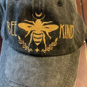 Bee Kind black stonewashed baseball hat.